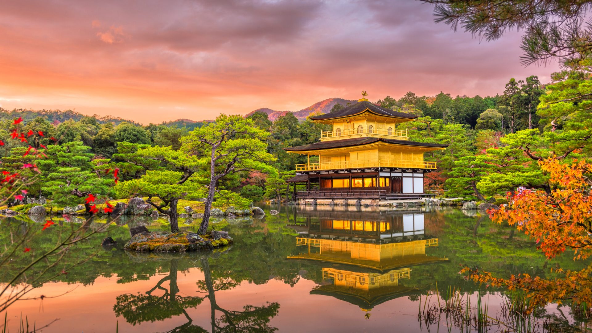 Kyoto, Japan at Kinkaku-ji, The Temple of the Golden Pavilion at dusk.